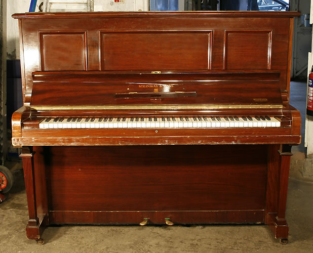 Steinway Model K upright Piano for sale with an mahogany case.