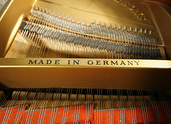 Steinway  model M piano made in Germany. We are looking for Steinway pianos any age or condition.
