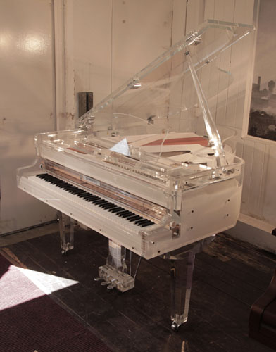 Brand new, Besbrode Model 170 Grand piano for sale with a transparent, acrylic, crystal case and chrome fittings. Piano has an eighty-eight note keyboard and a three-pedal lyre. 