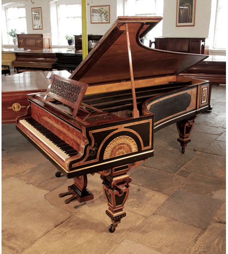 An 1861, Erard grand piano with casework featuring Egyptian Revival and Neoclassical elements by cabinet maker William Lomax 