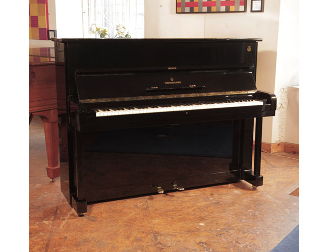 Reconditioned,  1960, Steinway Model Z upright piano for sale with a black case and brass fittings. . Piano has an eighty-eight note keyboard and two pedals.   