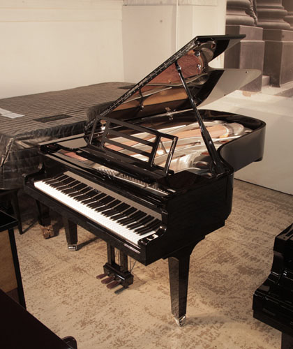 Brand new, Feurich model 218 concert I grand piano with a black case and chrome fittings. Piano features a gunmetal frame. Piano features a rectangular openwork music desk with LED strip lighting.  Piano has an eighty-eight note keyboard and a three-pedal piano lyre. 
