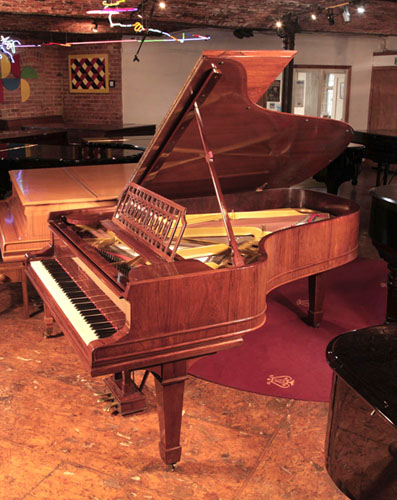 Restored, 1911, Steinway Model B grand piano for sale with a rosewood case, openwork music desk and spade legs. 