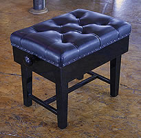Besbrode Pianos Adjustable, Real Leather, Concert Piano Stool. Brass studs around cushion. Eight buttons on cushion.