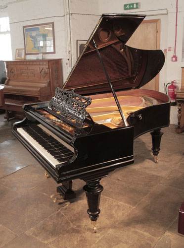 Restored, 1902, Bechstein Model V grand piano for sale with a black case, filigree music desk and turned, faceted legs.