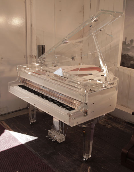 Brand new, Besbrode Model 170 Grand piano for sale with a transparent, acrylic, crystal case and chrome fittings.  Piano has an eighty-eight note keyboard and a three-pedal piano lyre. 