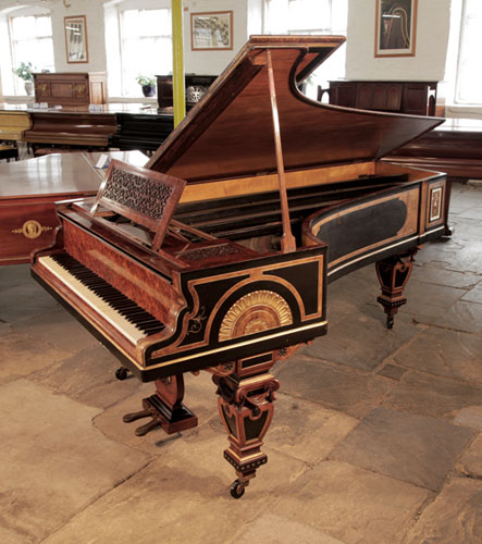 An 1861, Erard grand piano with  casework featuring Egyptian Revival and Neoclassical elements  by cabinet maker William Lomax