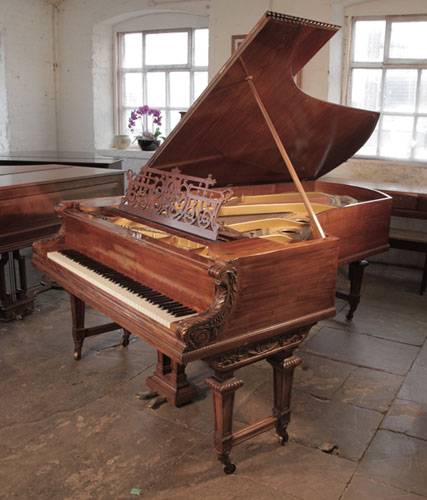 An 1893, Bechstein Model D concert grand piano for sale with a stunning, dark-veined, walnut case and Neoclassical carvings