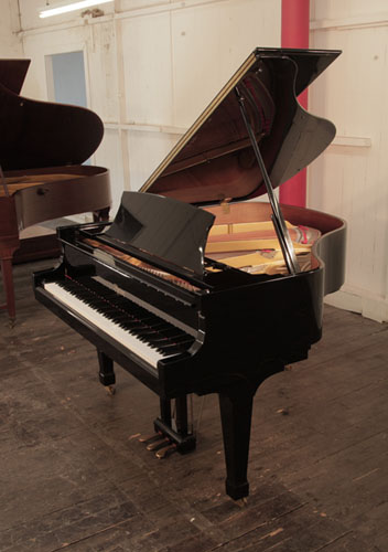 Reconditioned, 2006, Boston GP156 II baby grand piano with a black case and spade legs. Designed by Steinway. Piano has an eighty-eight note keyboard and a three-pedal lyre. 