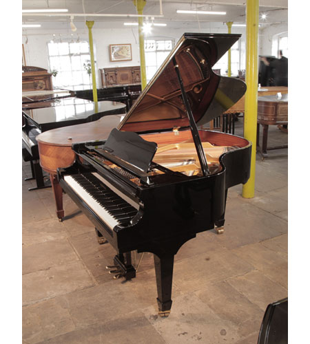 Reconditioned, 2017, W. Hoffmann V158 baby grand piano for sale in black gloss. Piano has an eighty-eight note keyboard and a three-pedal lyre.