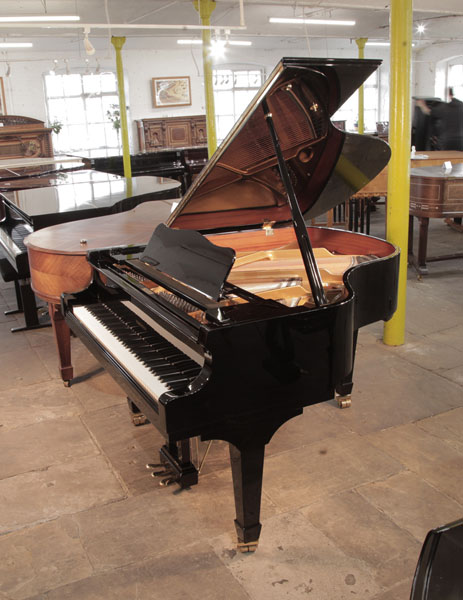 Reconditioned, 2017, Hoffmann V158 baby grand piano for sale with a black case and spade legs. Piano has an eighty-eight note keyboard and a three-pedal lyre.  