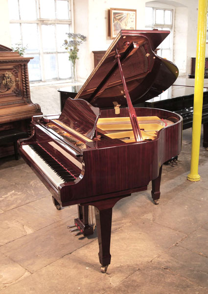 Reconditioned, Weber G-150 baby grand piano for sale with a mahogany gloss case. Piano has an eighty-eight note keyboard and a three-pedal lyre.  