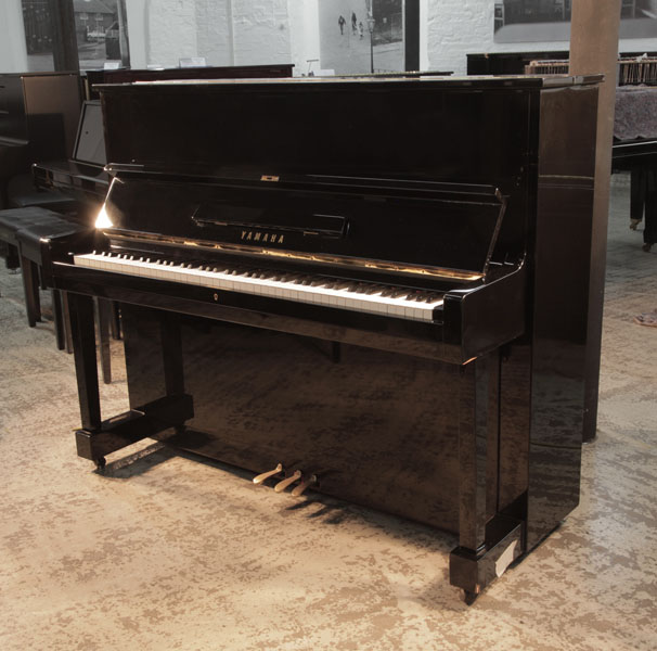 Reconditioned, 1970's, Yamaha U1 upright piano with a black case and polyester finish 
